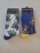 Two Pairs Of Pixar Crew Socks One Gray Pair And One Lavender Size: 9-13 NWT