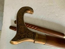 Victorian-style decorative walking cane with a brass Derby handle wooden Shaft