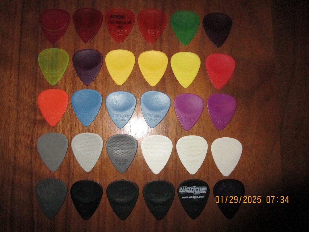 30 Assorted Wedgie Guitar Picks - Multiple Gauges Mostly New RL49