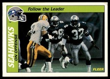 1988 Fleer Team Action FOLLOW THE LEADER (OFFENSE) #25 Seahawks corner wear