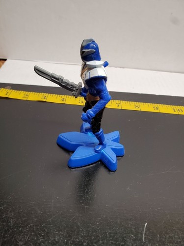 Blue Action Figure On Star-Shaped Base With Sword - Picture 2 of 9