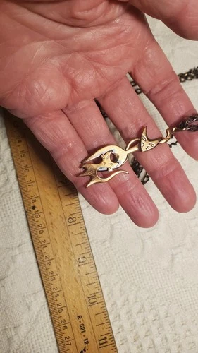 Vintage copper cats on chain