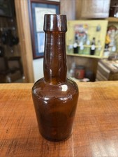 Vintage Amber Glass Bottle Featuring  R  And ...