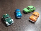 2 Corgi Toys 492 VW Vintage 1200 Saloon Beetle, 1 VWPolo and Dinky VW