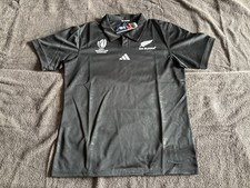 Image of New Zealand All Blacks RWC 23 Polo with Māori Art Work - Black Size L New