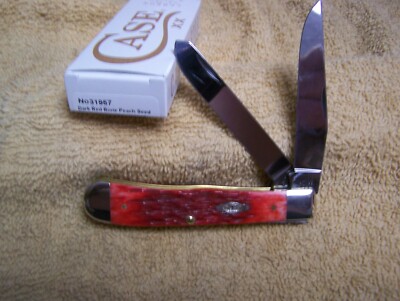 Case xx Dark Red Bone Peach Seed Jigged Trapper With Clip 6254 CS