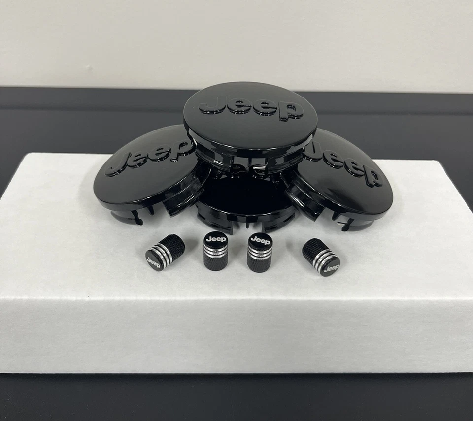 Tapacubos centrales para llantas y tapones de aire para neumáticos Jeep negros Cherokee Wrangler Liberty Compass Foto 2 de 4