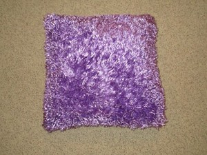 purple fuzzy pillow