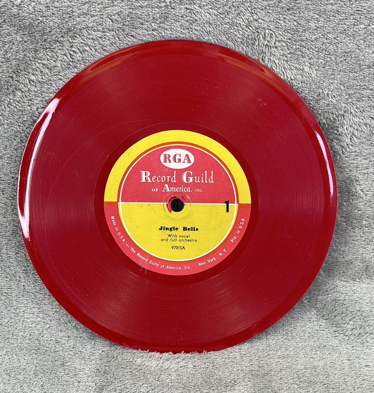 Vintage vinyl records 45rpm Jingle Bells and Auld Lang Syne. red 7
