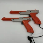 Lot of 2 Vintage Nintendo NES Zapper Orange NES-005 UNTESTED 1985