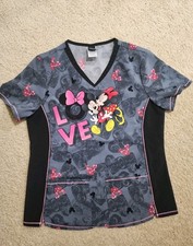 8 Scrubs top 2 Disney and 6 Solid Size M