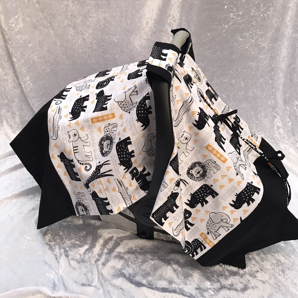 Lindo toldo/cubierta de lactancia materna para asiento de coche infantil con estampado de animales de safari Foto 3 de 4
