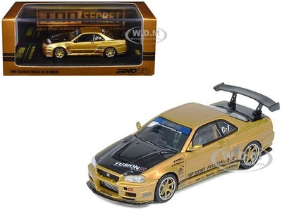NISSAN SKYLINE GT-R R34 RHD TOP SECRET GOLD 1/64 BY INNO MODELS