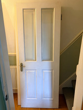 11 white wooden internal doors