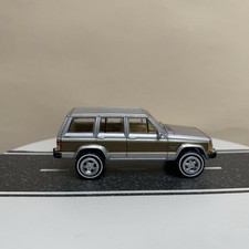 Greenlight Hollywood MacGyver 84-01 1986 Jeep Cherokee XJ Wagoneer 4x4 Silver NM