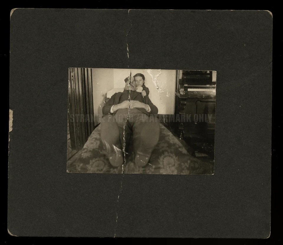 A genuine 1900s antique photo with a creepy, unusual perspective — the kind of eerie image that feels like a found-art mystery.