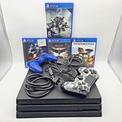 SONY PS4-PRO BUNDLE- CUH-7015B-1TB-4-games two controllers excellent condition!