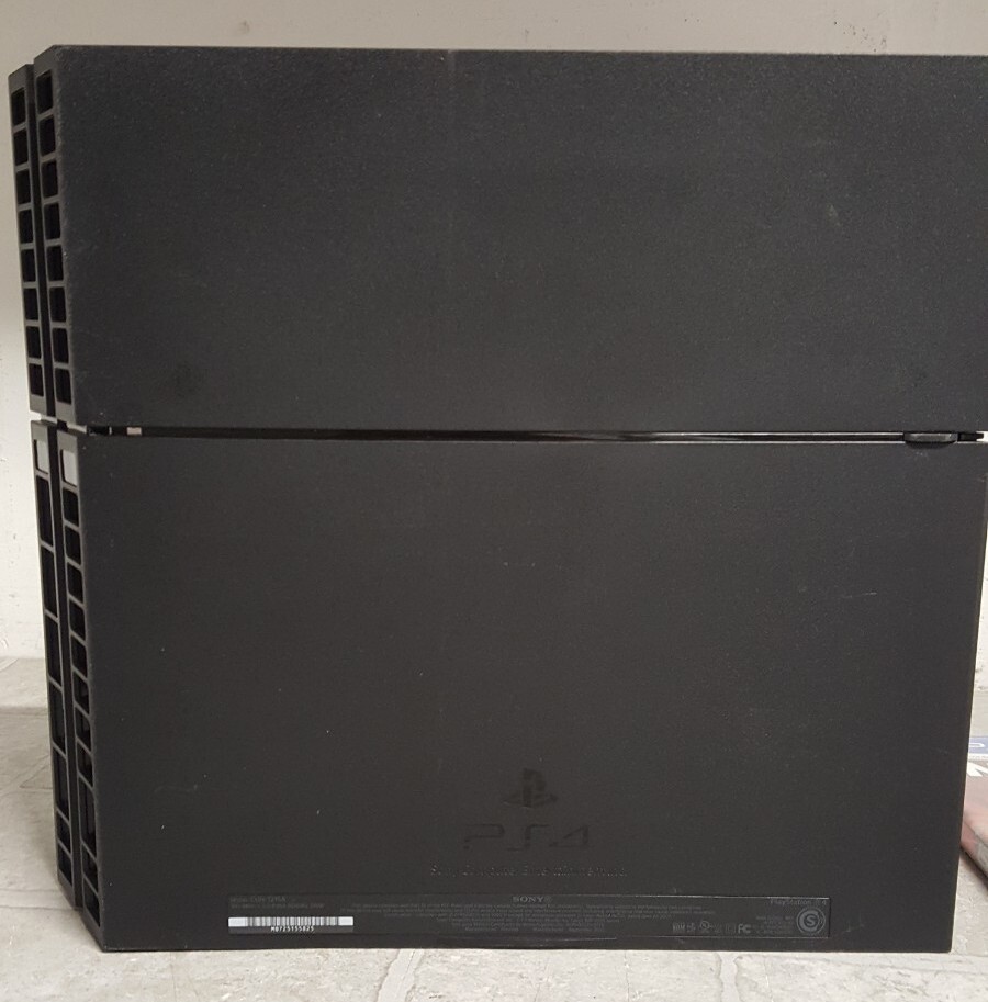 Sony CUH1215A PlayStation 4 Console 500GB w/2 Games + 2