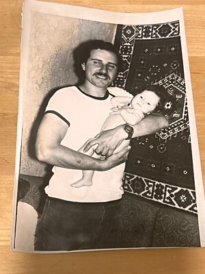 1970s Dad and son Carpet on the wall Soviet family Watch on hand Vintage photo
