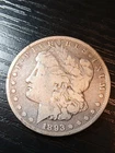 1893-CC silver Morgan dollar. Fine. Small ding. Nice. No reserve.