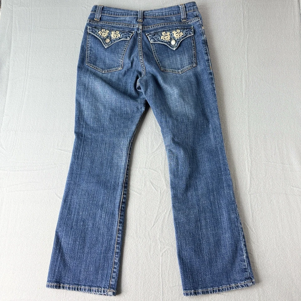 Pantalones de mezclilla para mujer Zena con solapa y bolsillo azul lavado medio talla 4 corte bota pequeño Foto 2 de 4