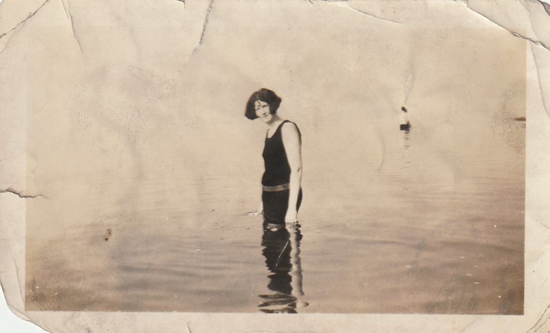 1920s Vintage photo of a woman in a swim suit standing in water, found photos