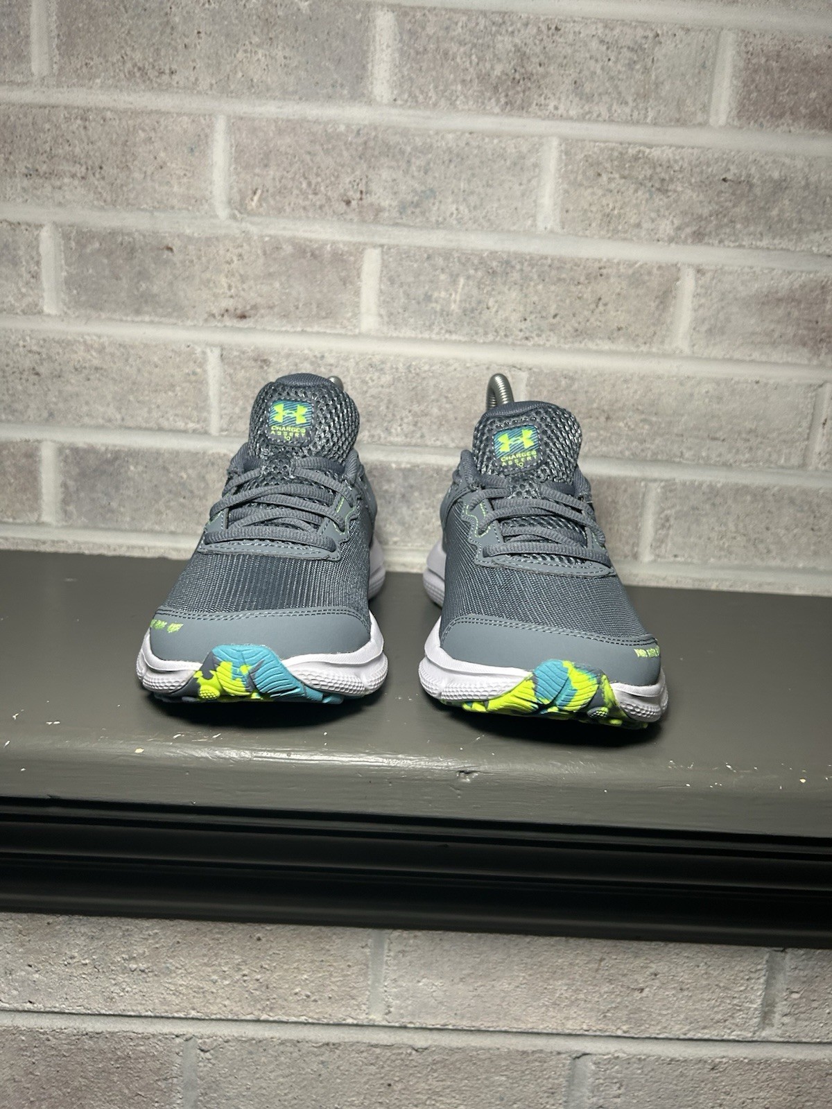 SAOLA Scarpe da ginnastica Under Armour Assert grigie 3026182 102 giovani taglia 5 5