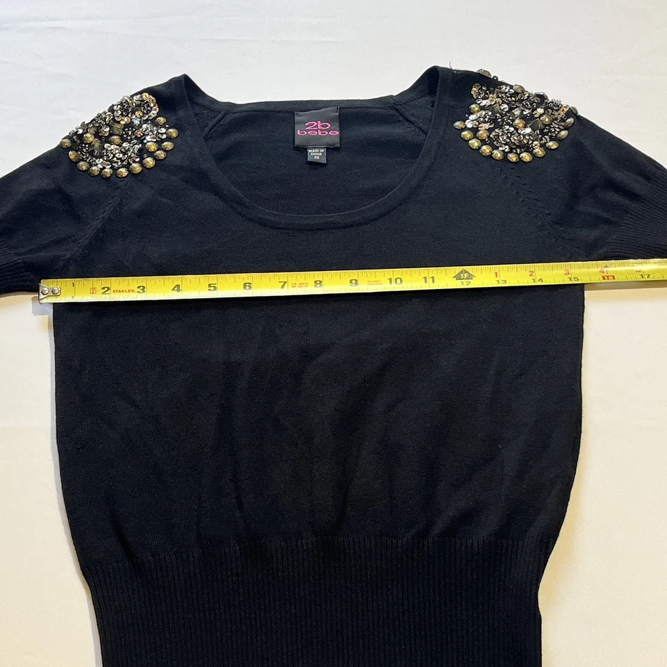 Top suéter de manga corta con cuello redondo y lentejuelas negras bebe para mujer Foto 4 de 4