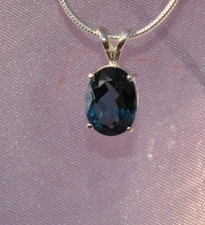9mm X 7mm  OVAL SHAPE LONDON BLUE TOPAZ PENDANT-  .925 STERLING SILVER