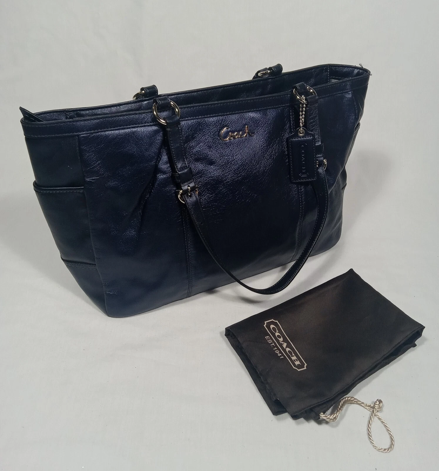 Bellissima borsa borsa Coach in pelle grande con zip blu metallizzato e marsupio marrone