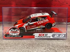 SCX 1/32 Scale ADVANCE 2.0 Seat Leon Cup Racer LUKOIL with lights - New