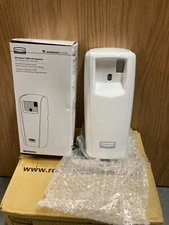 Microburst 9000  LCD , air freshener dispenser by Rubbermaid 