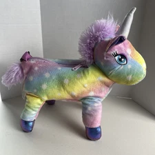 Hugfun Unicorn. Has Zipper Pouch. Approximately 11” W 9” H. Adjustable Strap.