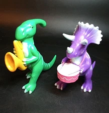 Vintage Triceratops Dinosaur Playing Drum by Ankyo & Parasaurolophus Saxophone 