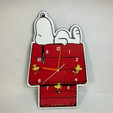 Peanuts Worldwide LLC Wall Clock Red Snoopy Design Analog Playful Retro Decor