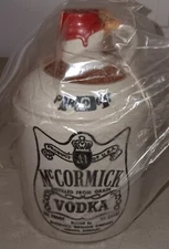 MCCORMICK "DISTILLED FROM.GRAIN VODKA" jug with cork.