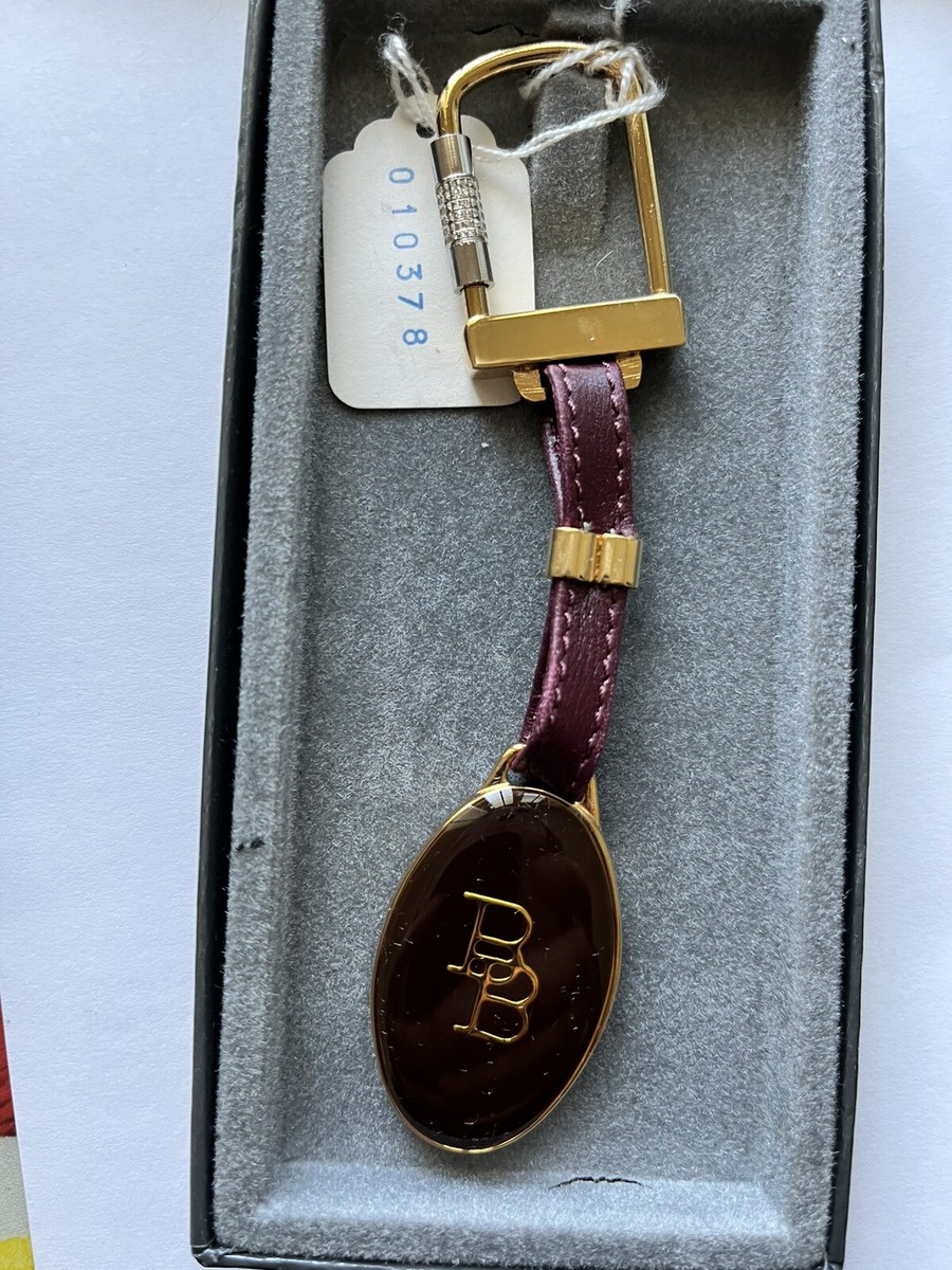 Beautiful Authentic Bally key chain with screw to unlock the latch