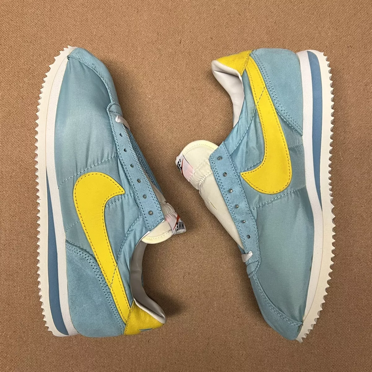 yellow and blue nike cortez