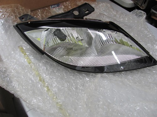 Faro delantero derecho RF 2003 2004 2005 Pontiac Sunfire NOS GM 22708375 - Imagen 10 de 11