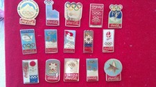 lot de pin's sur le logo Coca Cola et les JO