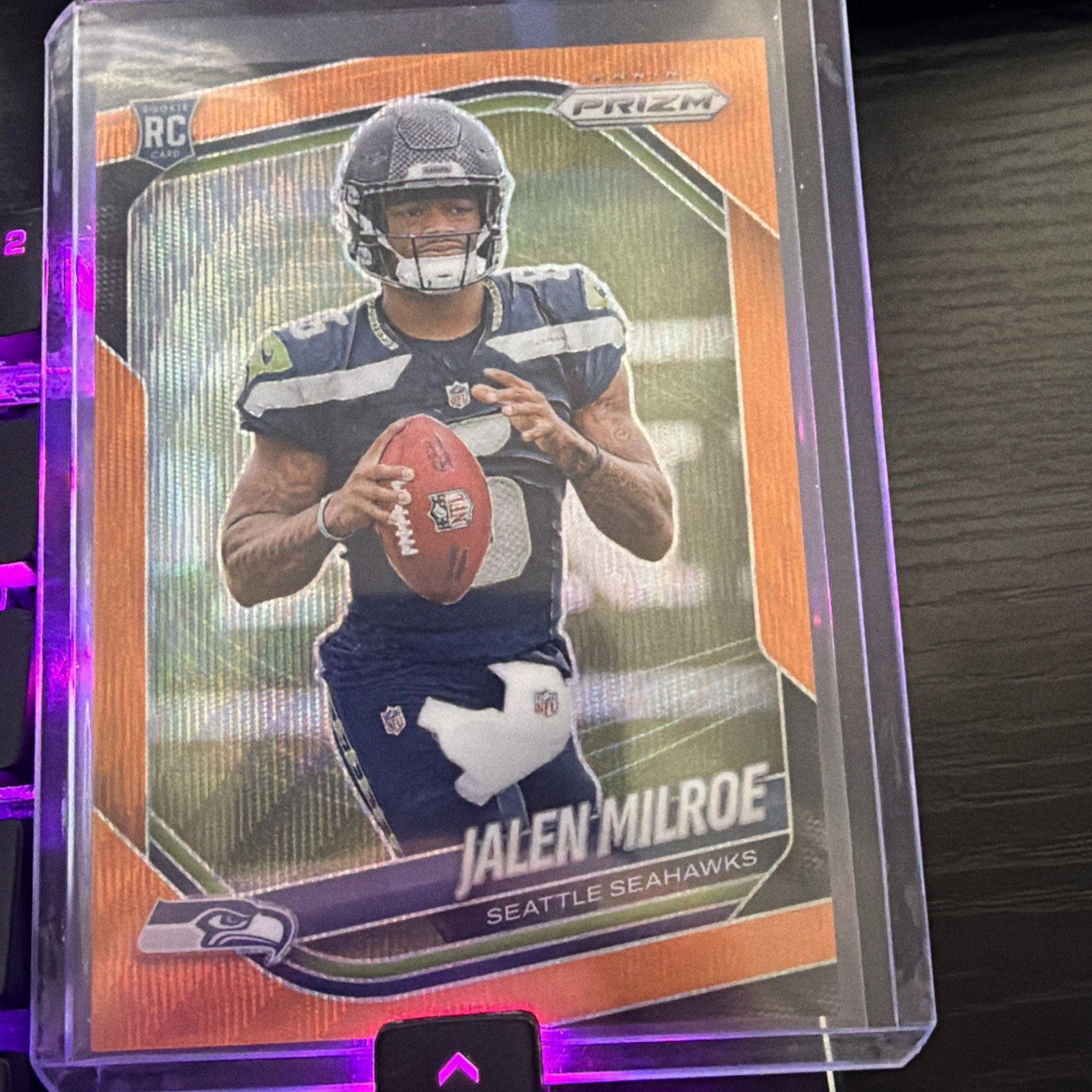 2025 Panini Prizm - Rookies Jalen Milroe #317 Orange Wave Prizm /65 (RC)