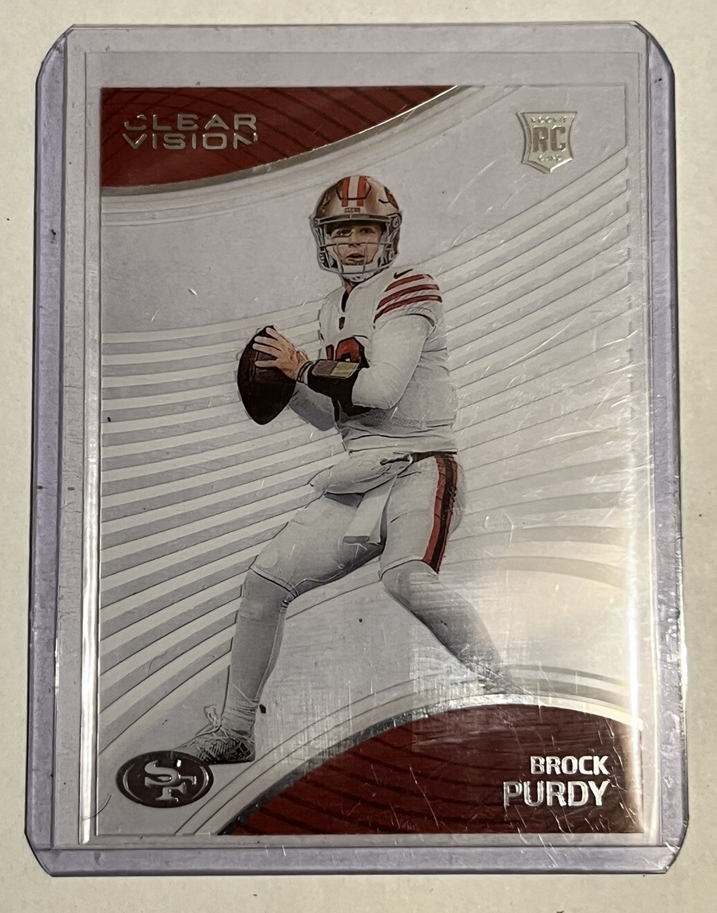 2022 Panini Chronicles - Clear Vision Rookies #CVR-8 Brock Purdy Rookie Card