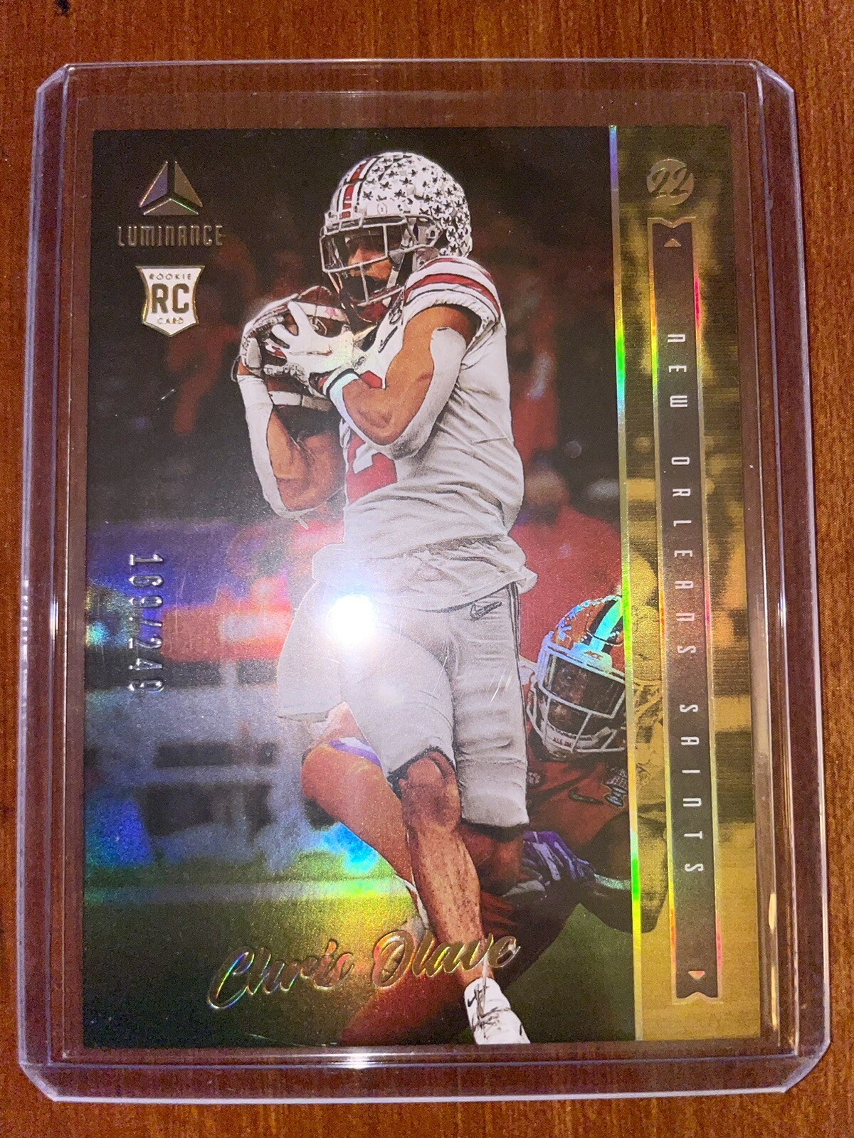 2022 Panini LUMINANCE Chris Olave ROOKIE GOLD 169/249 RC No. 116 NO Saints