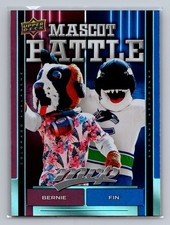 2025-26 Upper Deck MVP #MB-4 Bernie the St. Bernard/Fin The Whale Mascot Battle