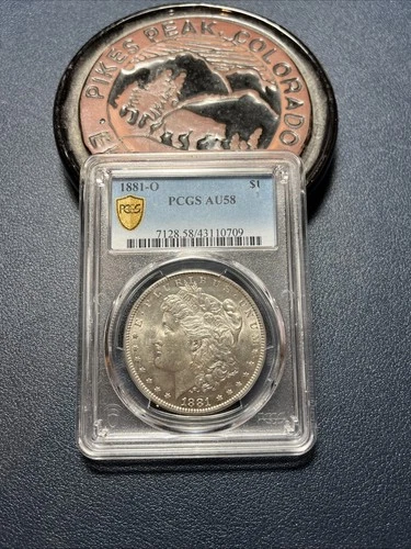 1881-O Morgan Silver Dollar, PCGS Gold Shield Label, AU 58