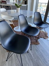 Authentic Eames/Herman miller molded plastic side chair.  445 at DWR  