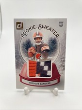 2025 Panini Donruss - Shedeur Sanders #SWE-SSS - Rookie Sweater (RC) - Browns
