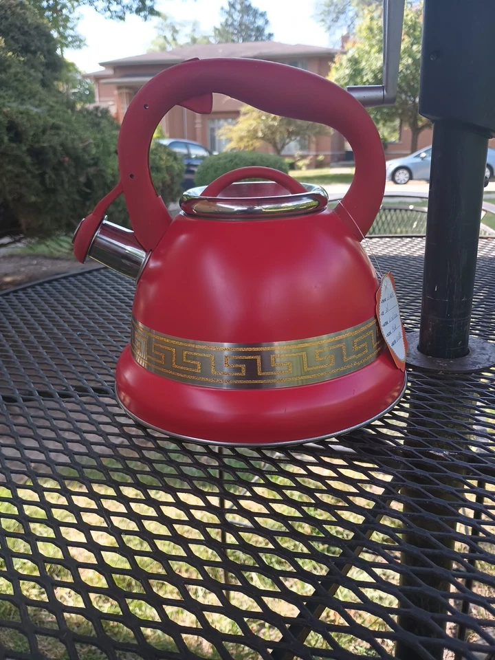 Tetera silbante de acero inoxidable de diseño alemán Pofann Foto 2 de 4