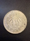 Photo of a Mexico Un Peso Silver coin from an eBay sale