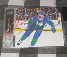 Travis Hamonic Signed Hockey Card Vancouver Canucks 